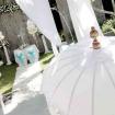 white umbrella garden wedding 